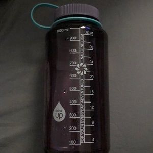 Cute water bottle, scratches and hole